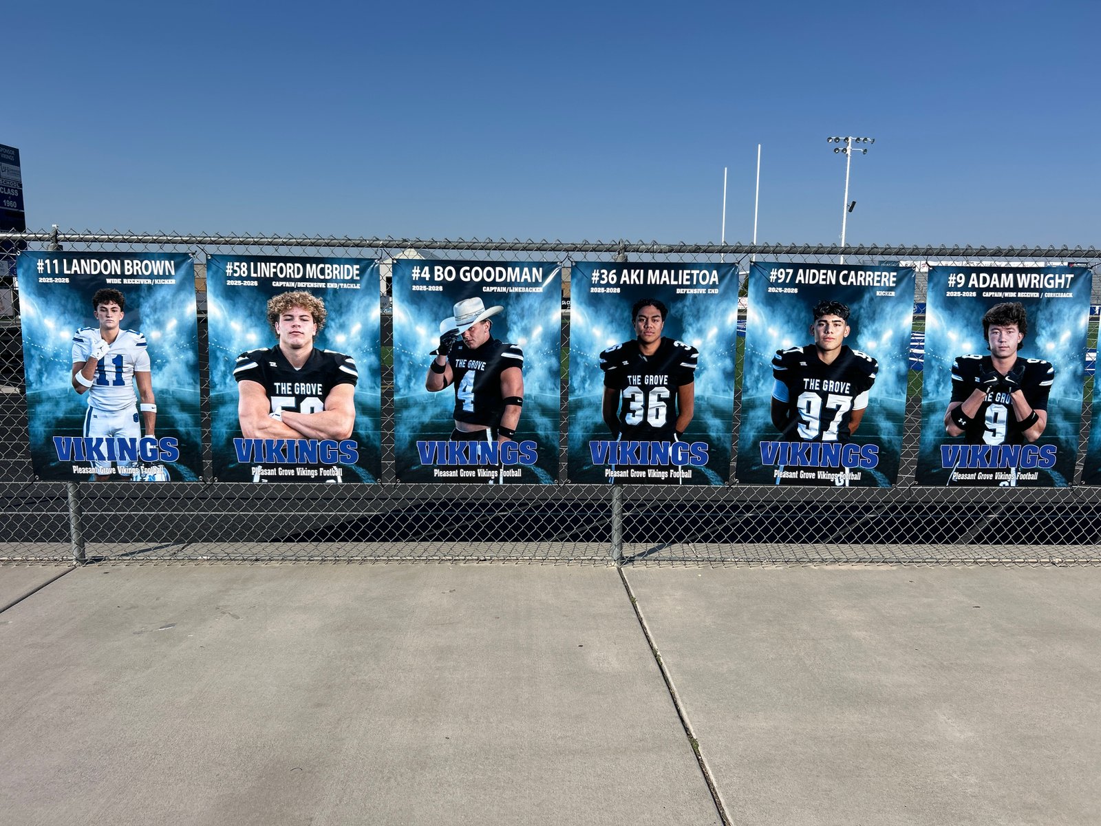 Pleasant Grove Vikings football player fence banners